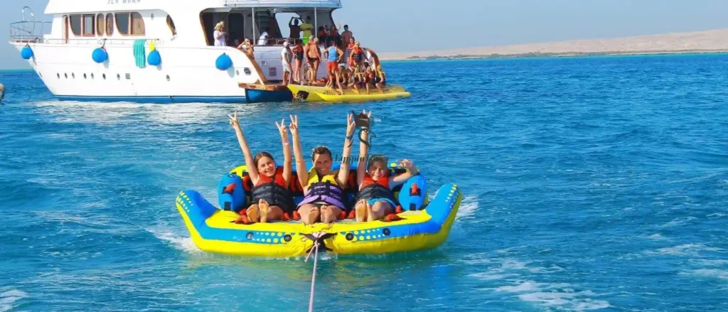Enjoying Beach Activities in Hurghada with family EgyptaTours